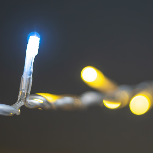 Гирлянда Нить 10м Тепло-Белая с Мерцанием Белого Диода 220В, 100 LED, Провод Прозрачный ПВХ, IP54