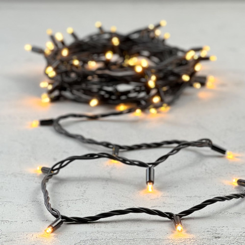 Гирлянда Нить 10м Экстра Тепло-Белая 24В, 75 LED, Провод Черный Каучук, IP65