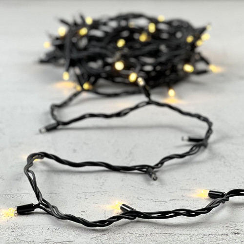 Гирлянда Нить 10м Тепло-Белая с Мерцанием Каждого Диода 220В, 75 LED, Провод Черный Каучук, IP65