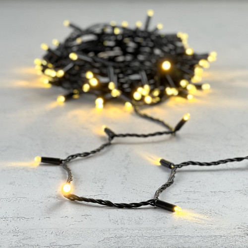Гирлянда Нить с Колпачком 10м Тепло-Белая 24В, 100 LED, Провод Черный ПВХ, IP65